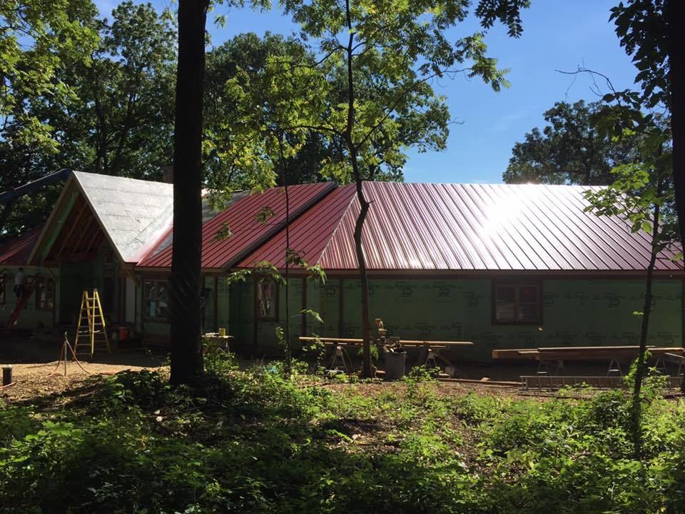 Custom tin roofing on Burlington home