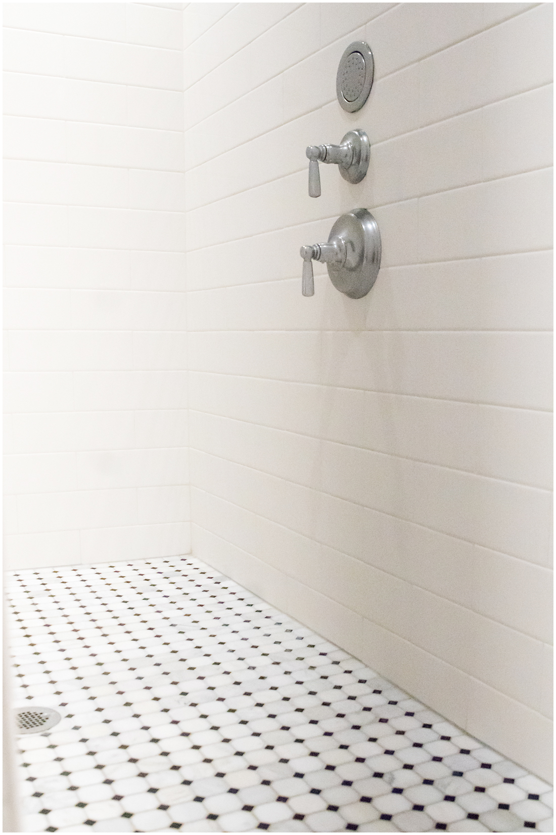Wall spouts, custom tile and beautiful colors make this luxury shower a one of a kind space Custom Shower Tile