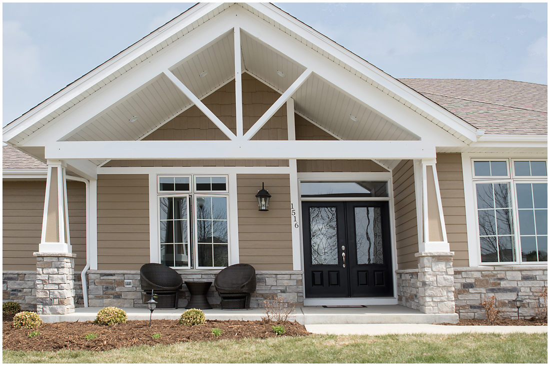 This custom ranch home in Caledonia features a lovely little porch Ranch Home Entrance
